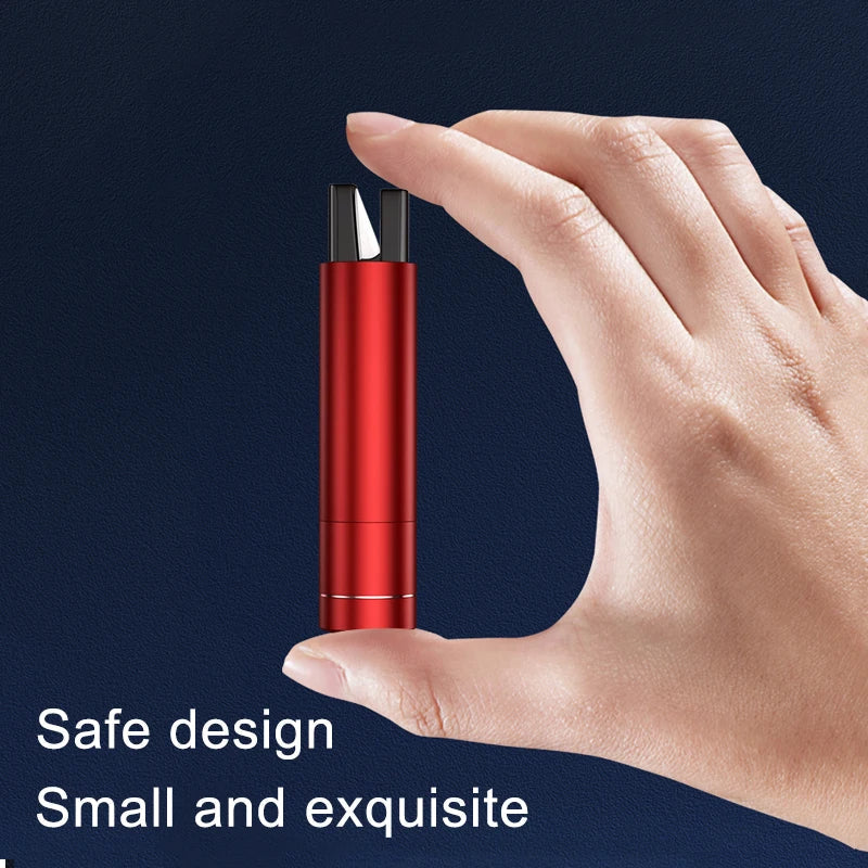 Compact SafetyStrike emergency escape tool held in hand